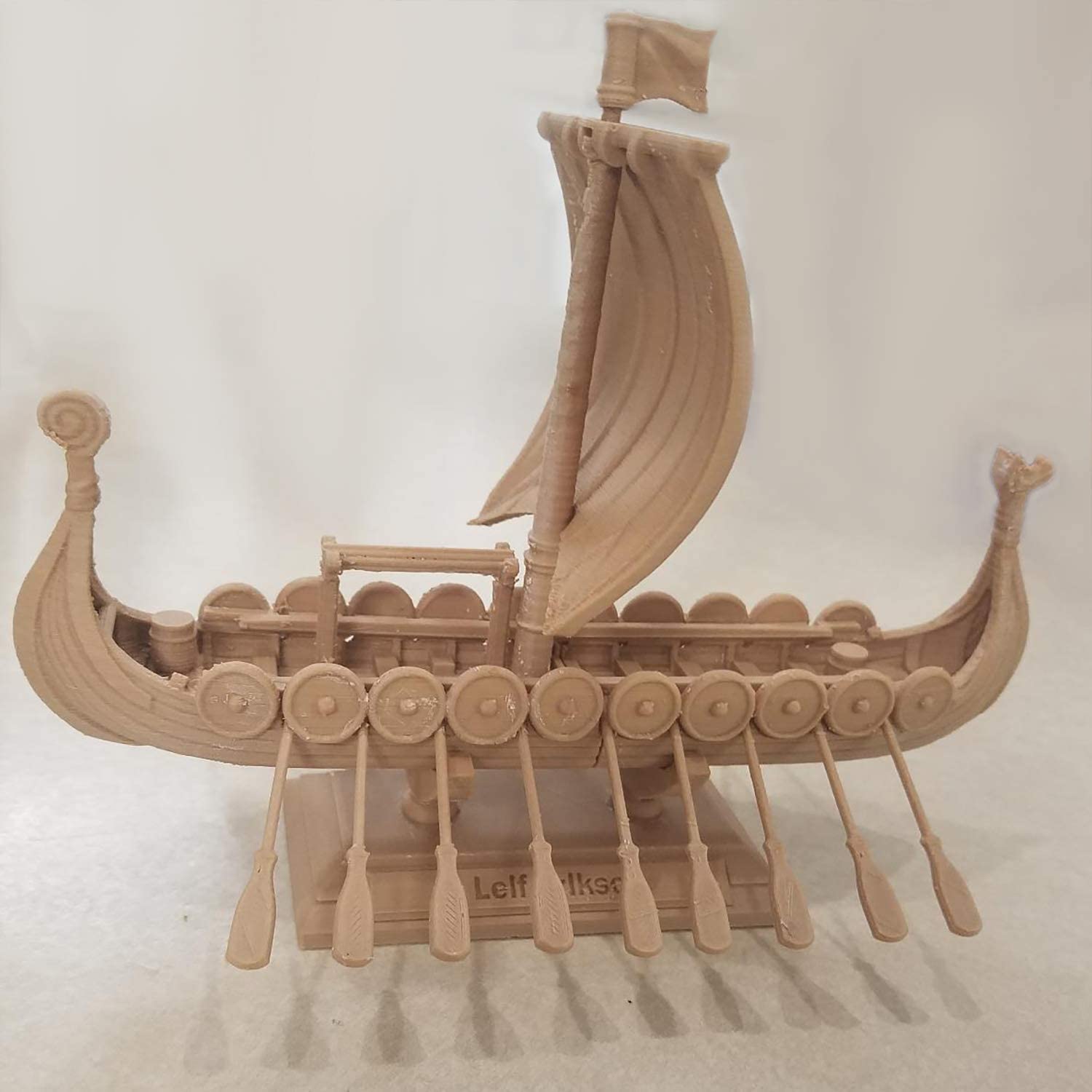 Amolen Wood PLA 3D printed Viking ship model, highlighting wood texture and detail.