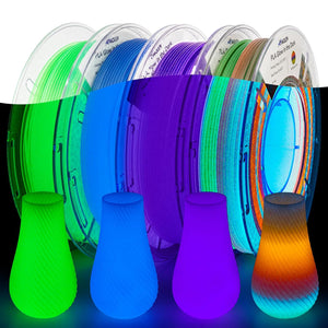 Amolen PLA Glow in the Dark filament variety pack, demonstrating glow-in-the-dark effect with lamps.
